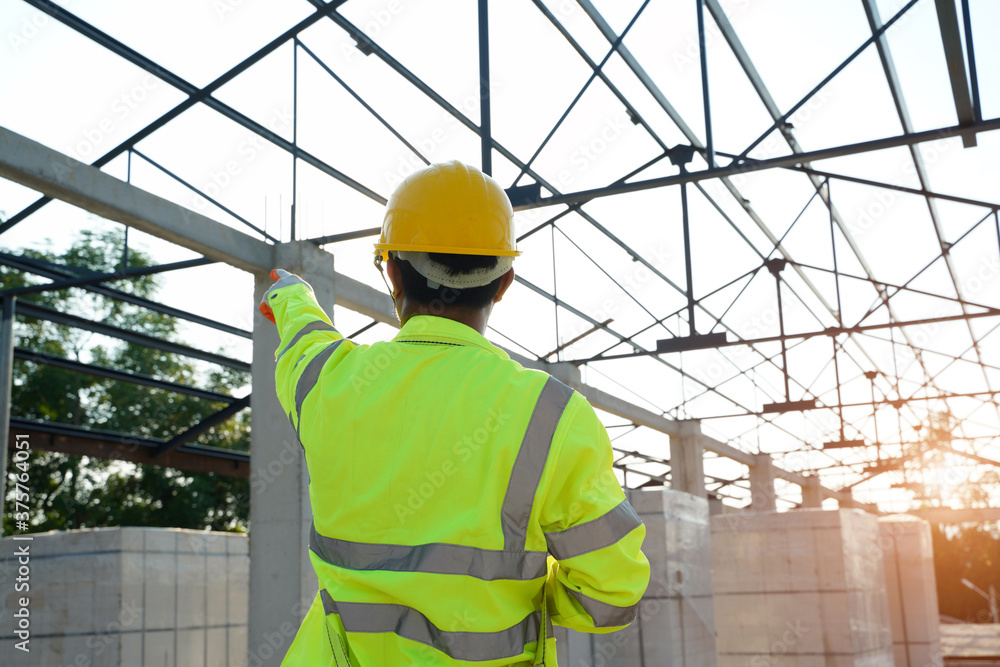 Construction Worker in building construction site,Construction Worker Planning Developer Concept. Construction Worker in building construction site,Construction Worker Planning Developer Concept.