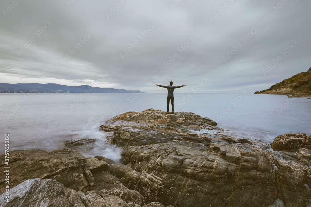 Free man on coast. La Costa Brava, Spain. Free man on coast. La Costa Brava, Spain.