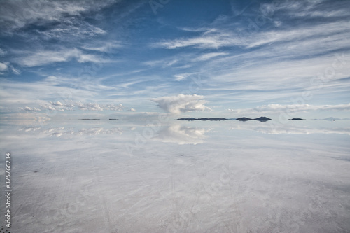 flat uyuni salt and desert , infinite mirror and water 