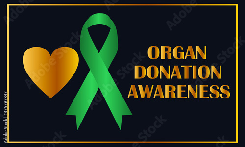 Green awareness ribbon on dark background. Organ Donation Awareness   