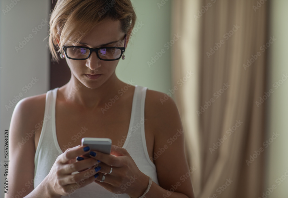 Woman Checking Her Phone Woman Checking Her Phone