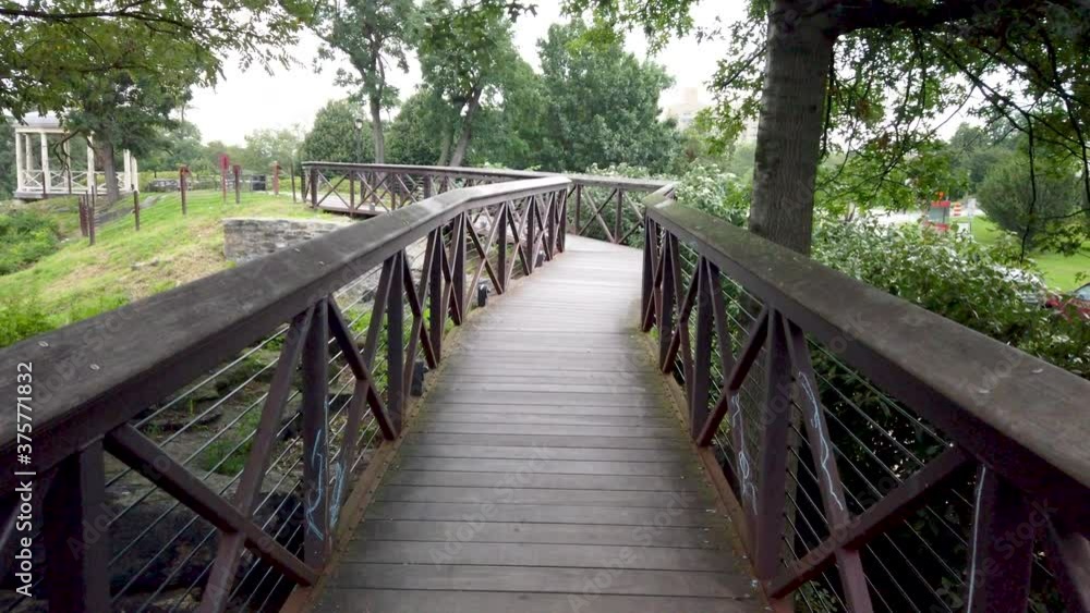 Slow Motion of wooden bridge in the park Slow Motion of wooden bridge in the park