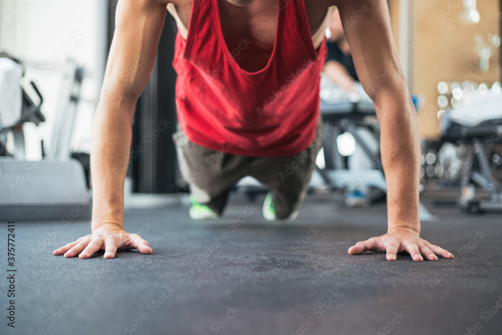 Young muscular man doing push up Young muscular man doing push up