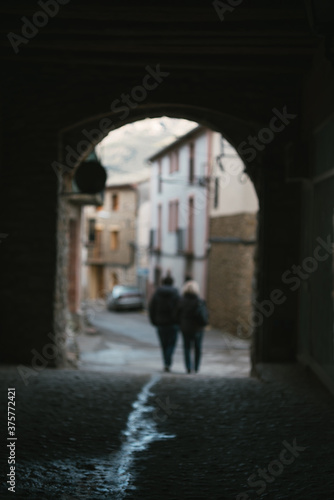 Wallpaper Mural Group of people walking at night on a shopping street. Torontodigital.ca