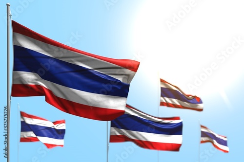 beautiful 5 flags of Thailand are waving against blue sky illustration with soft focus - any celebration flag 3d illustration..