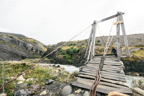 Wallpaper Mural Wood bridge over river in Torres del Paine, Chile Torontodigital.ca