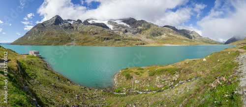 Bernina mountain pass. Wonderful landscape of the White Lake in summer time. Glacier on the back. Amazing landscape of the Switzerland land. Best of Swiss. Famous destination and tourists attraction