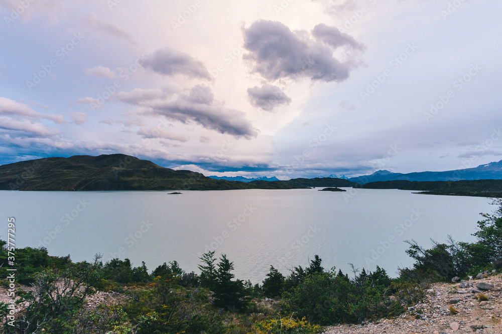 Lake with mountains and dramatic clouds in Torres del Paine, Patagonia, Chile Lake with mountains and dramatic clouds in Torres del Paine, Patagonia, Chile