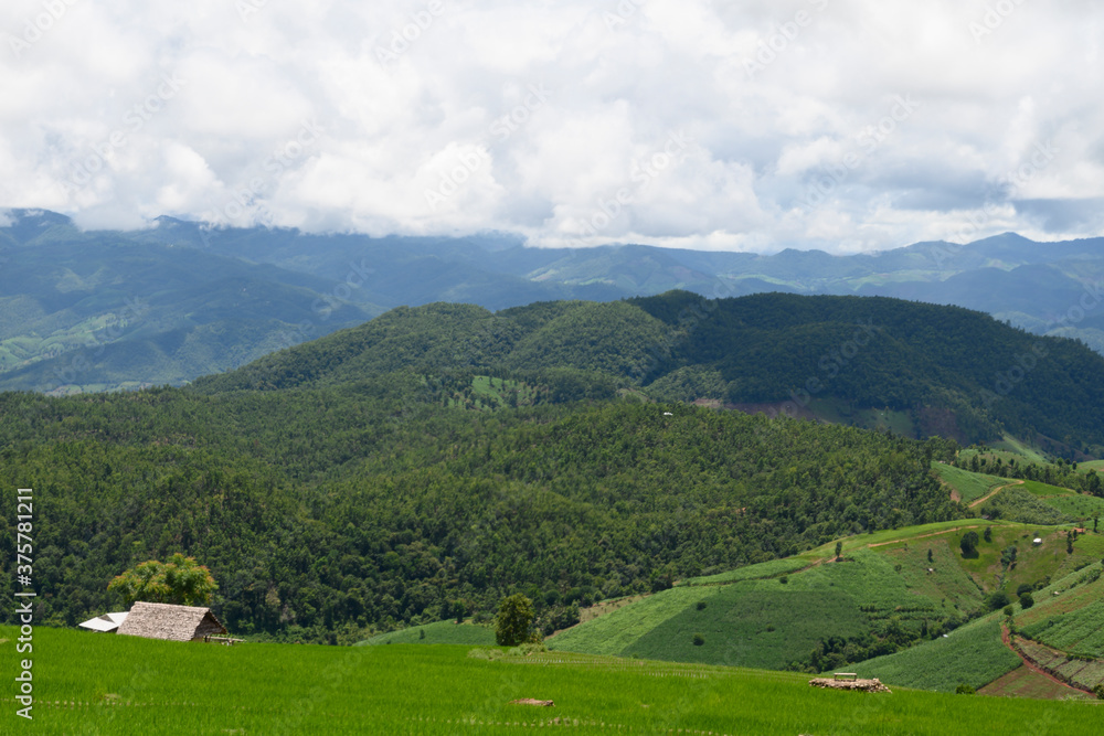 Natural scenery of green mountains and clear blue sky