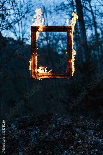 frame of flames in the dark photo