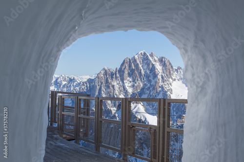 Mont Blanc massif through a tunnel in the snow photo