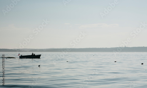 Boat Cruising in Britol Bay Maine, USA photo