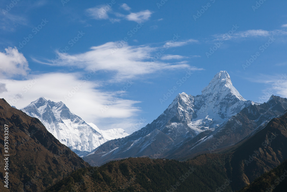 Mt. Amadablam standing tall with Tengboche below it. Mt. Amadablam standing tall with Tengboche below it.
