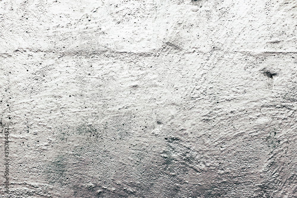 Close up of silver paint covering graffiti on urban concrete wall Close up of silver paint covering graffiti on urban concrete wall