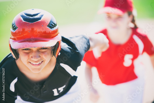 Baseball: Runner Takes Off From Third Base To Score photo