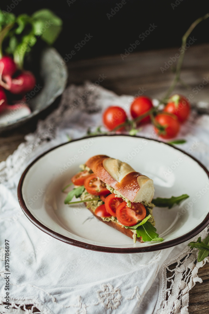 Vegan sandwich with guacamole and cherry tomato Vegan sandwich with guacamole and cherry tomato
