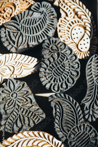 Henna stamps detail shot in a local market in India photo