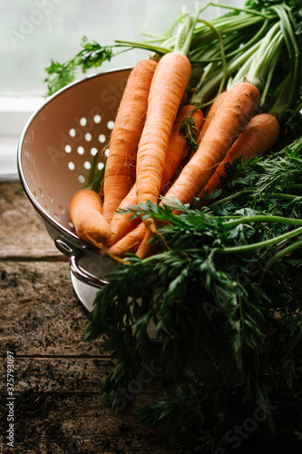 Carrots in a colander photo