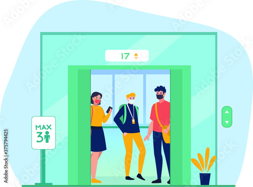 Masked peoples are keeping their distance in public elevator