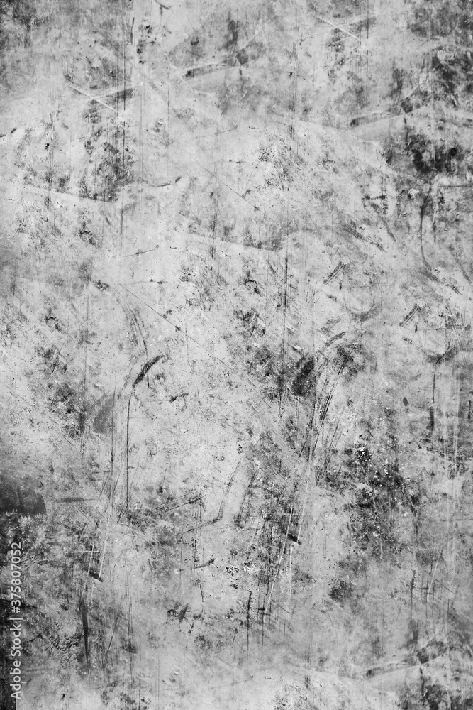 Fototapeta premium The concrete wall is gray spattered with black paint . Texture or background