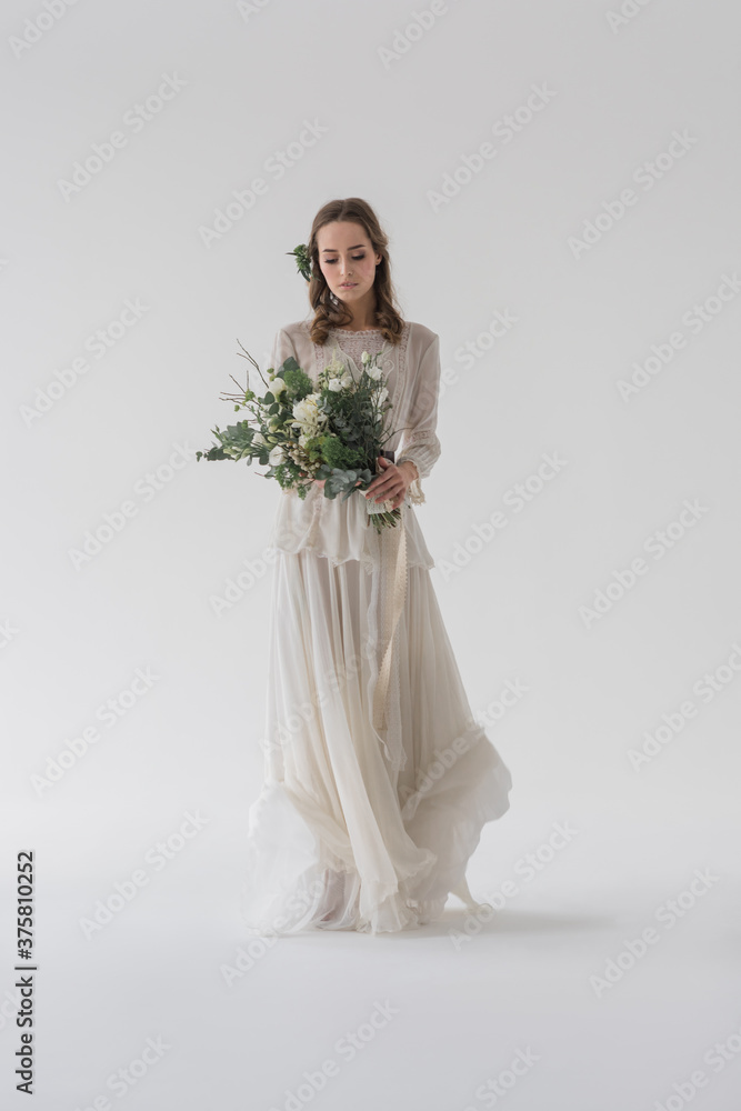 Beautiful woman wearing floor lenght wedding dress Beautiful woman wearing floor lenght wedding dress
