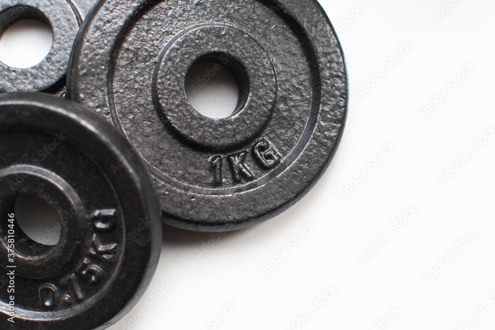 dumbbell pancakes on a white background sport with dumbbells dumbbell pancakes on a white background sport with dumbbells