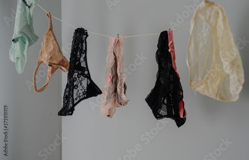 Variety of panties and underwear hanging from clothes line