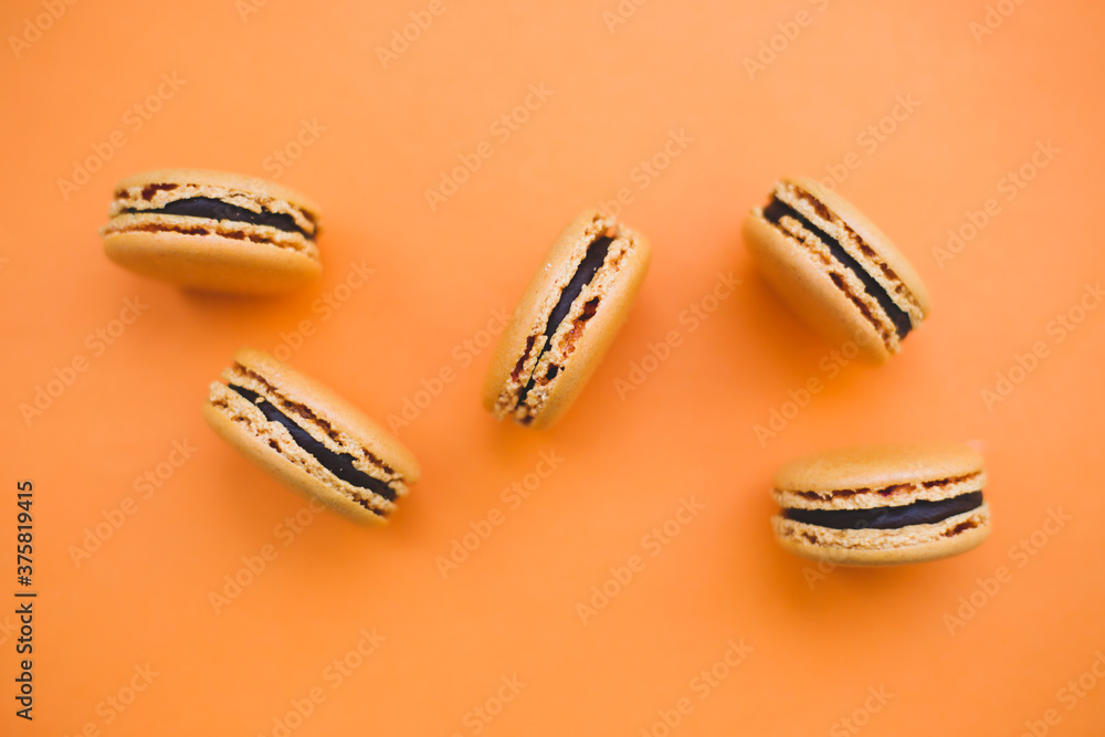 Macaroons on an orange background Macaroons on an orange background