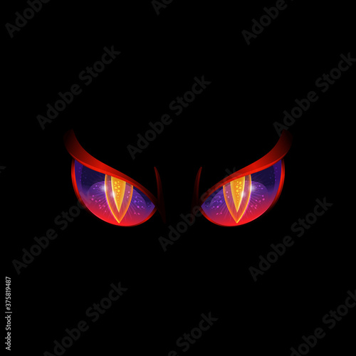 Glowing evil eyes on black background - angry Halloween monster eyes