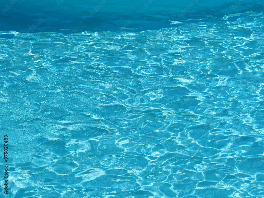 Beauty waters in swimming pool on african Sal island in Cape Verde in 2019 hot sunny spring day on March.