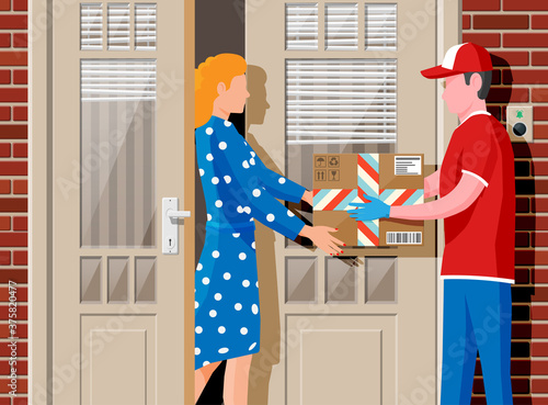 Woman receive cardboard box from man. Courier character holds parcel in his hands. Carton delivery packaging closed box with fragile signs. Free and fast shipping. Vector illustration in flat style