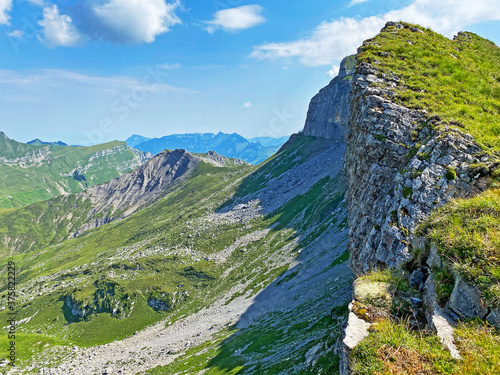 Panorama from the alpine peak Brünighaupt (Bruenighaupt or Brunighaupt) above the Melchtal valley (or Melch valley) and in the Uri Alps mountain massif, Melchtal - Canton of Obwalden, Switzerland photo