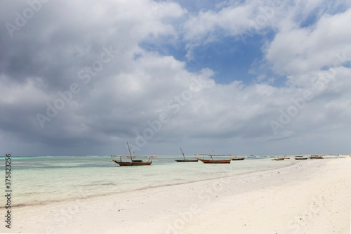 White sands beach with fishing boats,Zanzibar island,Tanzania