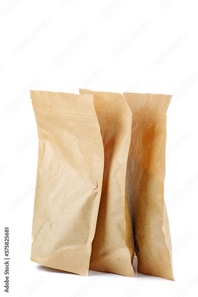 Few brown paper packets on a white background Few brown paper packets on a white background
