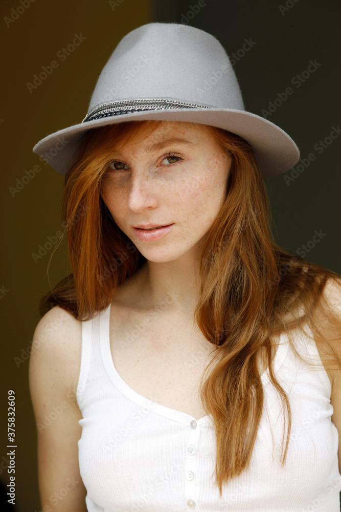 young woman with grey hat young woman with grey hat