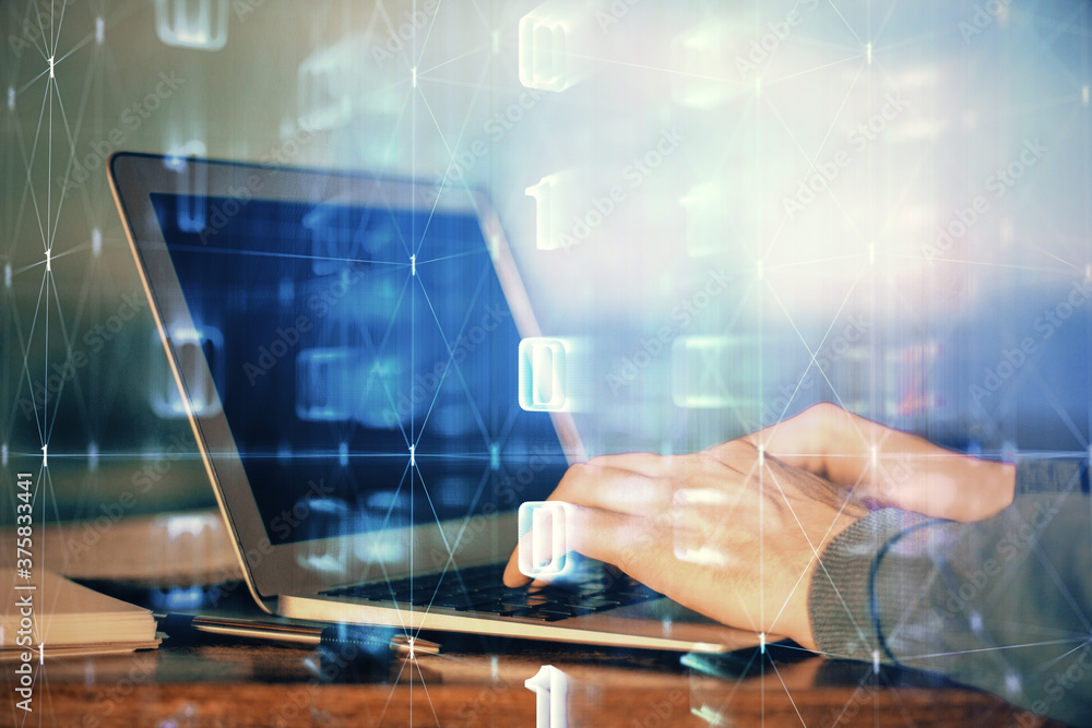 A man working on Laptop with technology theme drawing. Concept of big data. Double exposure. A man working on Laptop with technology theme drawing. Concept of big data. Double exposure.