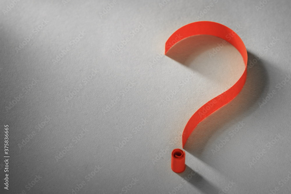 Colorful bright orange coiled paper question mark - obrazy, fototapety, plakaty 