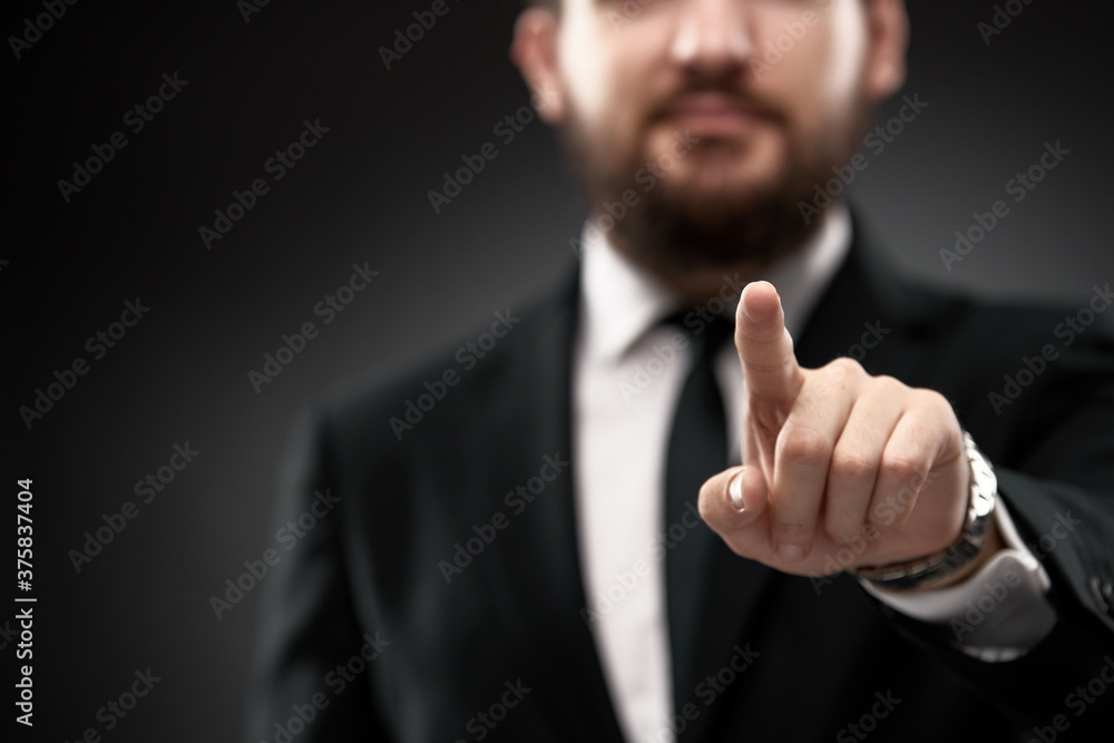 Businessman pointing finger forward Businessman pointing finger forward