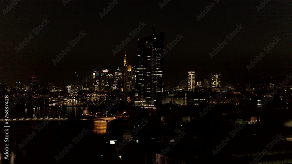 Cityscape illuminated at night, Frankfurt, Hesse, Germany Cityscape illuminated at night, Frankfurt, Hesse, Germany