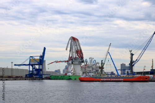 August 21 2020 - Rostock-Warnemünde, Mecklenburg-Vorpommern/Germany: Details of the industry port and dockside cranes at the europort harbour in Rostock © Dynamoland