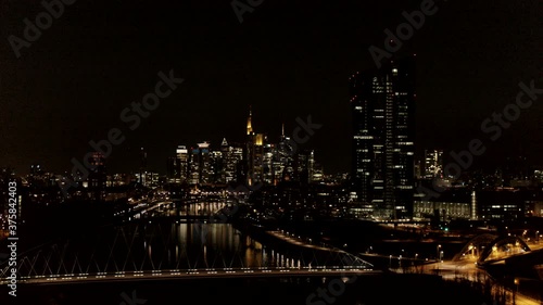 Illuminated cityscape at night, Frankfurt, Hesse, Germany photo