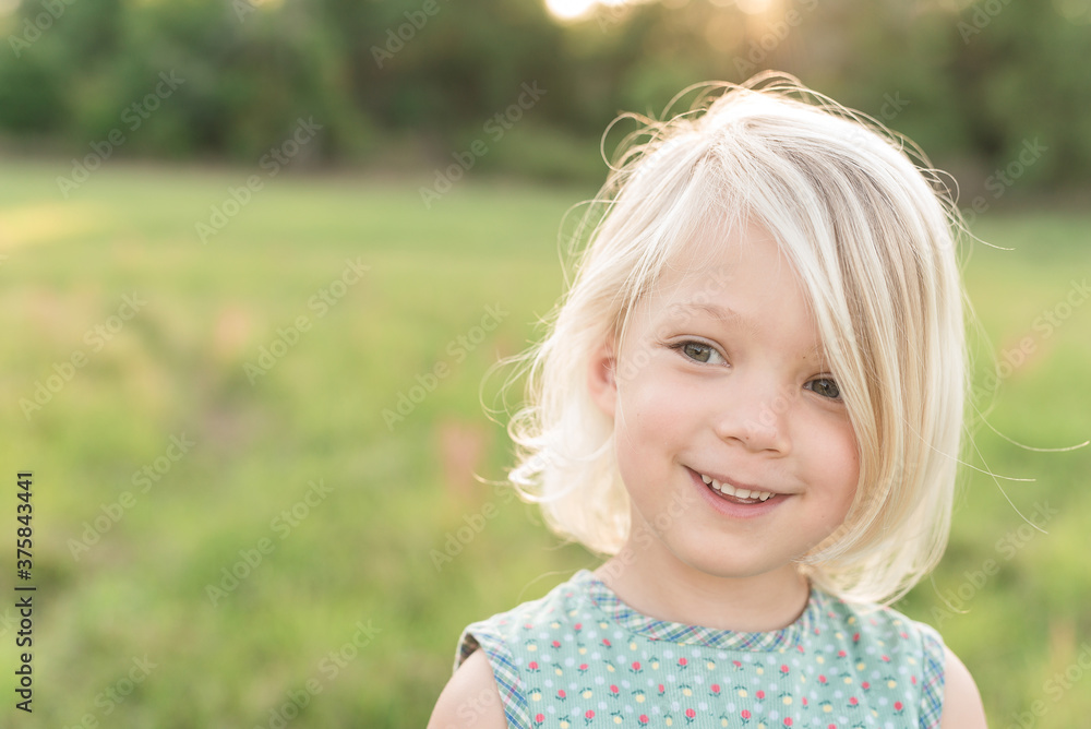 A Little Girl Looks Off To The Side A Little Girl Looks Off To The Side