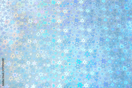 Wallpaper Mural Blurred blue trendy backdrop with stars. Bright holographic foil background. Colorful background. Flat lay Torontodigital.ca