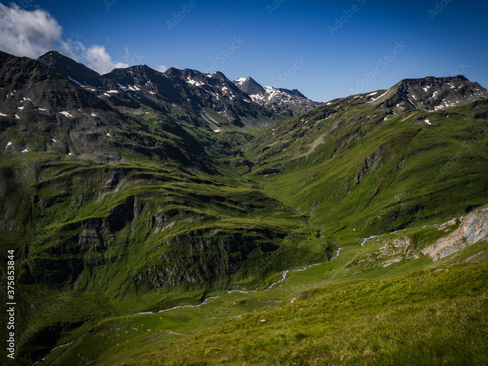 Great views to the peaks, valleys and glaciers of the Austrian Alps, Hohe Tauern park. Charming and beautiful scene with amazing meadows, near nice city Kals am Grossglockner, Austria, Europe.