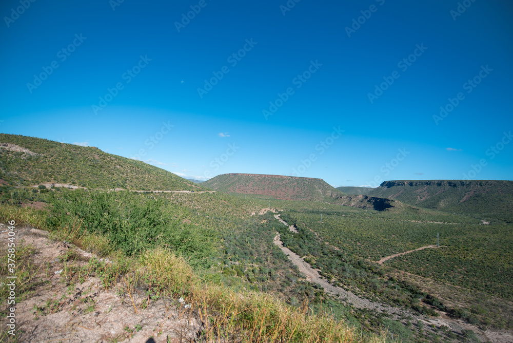 Fototapeta premium mountains on the blue sky road to heaven 3