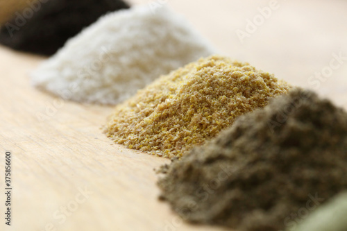 Set of organic vegetarian flour on wooden background