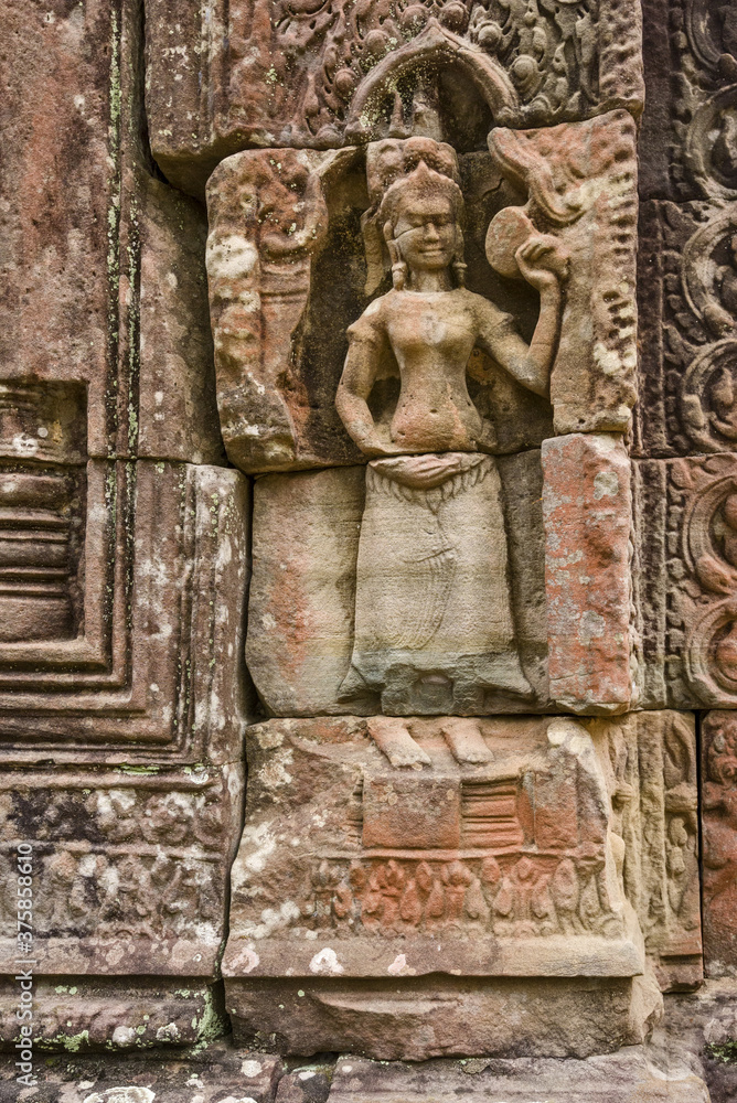 Stone bas relief carvings of a devata deity at Ta Som,  Angkor, Siem Reap Cambodia