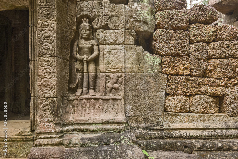 Gate of the gallery surrounded by two guards in Ta Som,  Siem Reap Cambodia