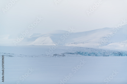 Konigsbergbreen glacier head on Svalbard, Spitsbergen Winter scenery of Spitsbergen, Svalbard © magcs