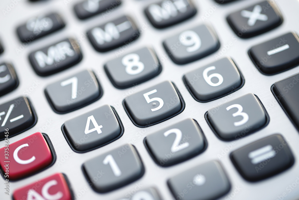 close up calculator focus at on press button keyboard. concept calculate account finance. close up calculator focus at on press button keyboard. concept calculate account finance.